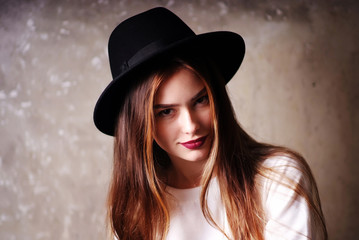 Portrait of young playful pop positive in hat fashion modern woman gentle model fashion look girl