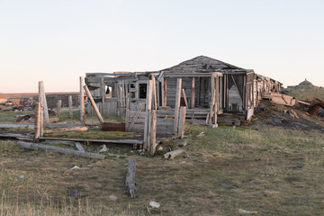 The old wooden destroyed house