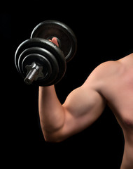 Fototapeta na wymiar Biceps beginner bodybuilder
