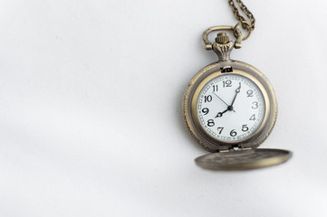 pocket watch on white background	old