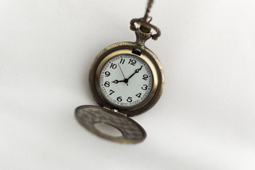 pocket watch on white background	 old