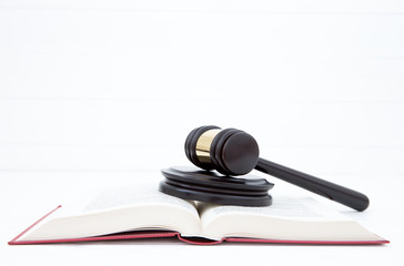 wooden gavel and books