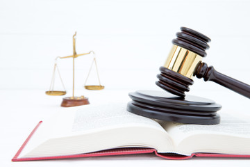 wooden gavel and books