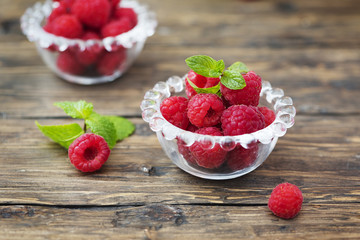 Fresh sweet raspberry on the wooden table