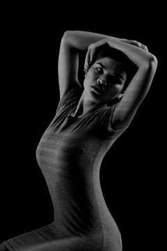 High fashion look shape portrait of sexy young female woman play two hands and arms with Black and White concept