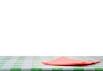 Red napkin on the table  with isolated background