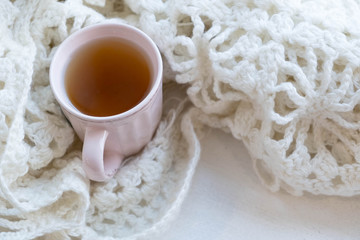 Cozy winter still life: opened book. Warm and comfy autumn or winter concept.