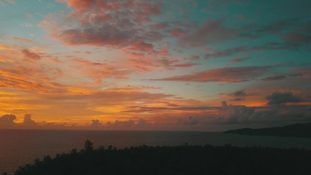 Beautiful sea sunset with blue orange sky on tropical island