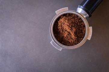 Roasted Ground Coffee in Espresso Machine Equipment