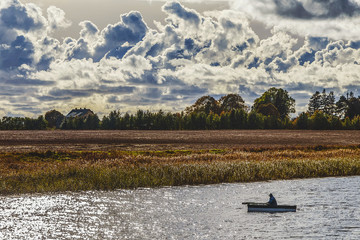 Very beautiful autumnal natural view with the boat