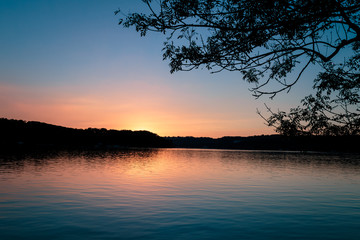 Fototapeta na wymiar See bei Sonnenuntergang