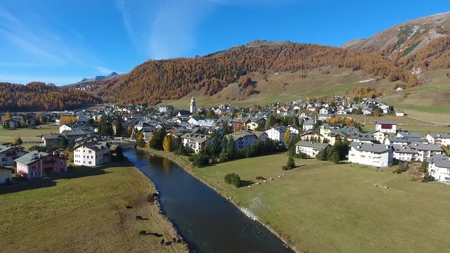 Village of Celerina near Sankt Moritz. Nature, houses and river in Engadine Valley. Aerial view