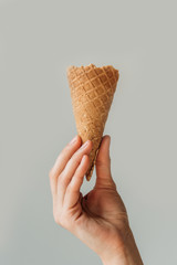 woman holding ice cream cone