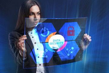 The concept of business, technology, the Internet and the network. A young entrepreneur working on a virtual screen of the future and sees the inscription: Data security
