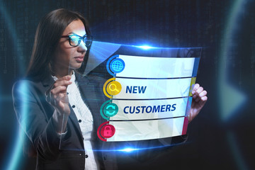 The concept of business, technology, the Internet and the network. A young entrepreneur working on a virtual screen of the future and sees the inscription: New customers