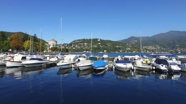 Port of Como, boats on lake of Como