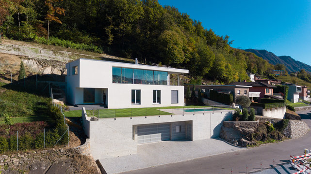 Modern villa with swimming pool, aerial view