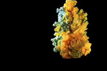  explosion of acrylic colors that create a cloud with soft and random shapes under water. concept of creativity and art.