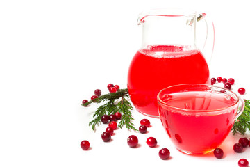 Drink juice from berries of cranberries in a glass cup and in a jar on a white background isolate