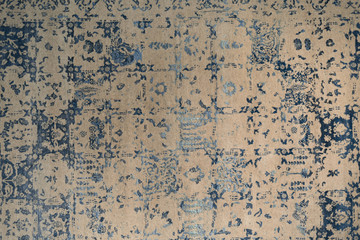 Handmade color woolen carpet background. Grunge texture