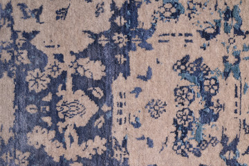 Handmade color woolen carpet background. Grunge texture