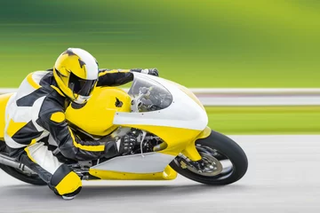 Cercles muraux Sport automobile Pratique de la moto se penchant dans un virage rapide sur la bonne voie