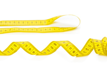 yellow metric measuring tape isolated on white panorama background