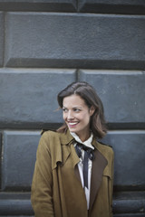 Obraz premium Happy girl smiling while looking away