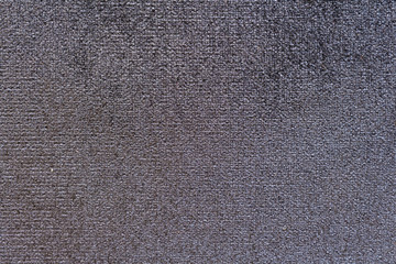 Texture of natural linen fabric in pattern gray color close-up in vintage style
