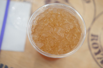 Ice lemon tea in plastic glass