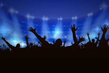 Silhouette Crowd people enjoying the concert, happy people jumping, a large group celebrating new...