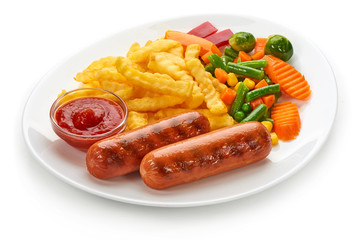 Grilled sausages with potatoes fries and vegetables, isolated on white background