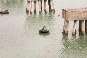 Fototapeta na wymiar Traditional Vietnamese boats in the harbour