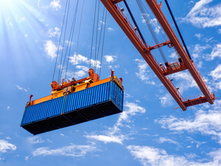 Industrial port crane lift up loading export containers box onboard at port of Thailand, Look up...