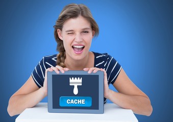 Woman holding tablet with Cache button and clean brush icon