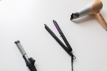 Naklejka premium hairdryer, hot styler and curling iron or tongs