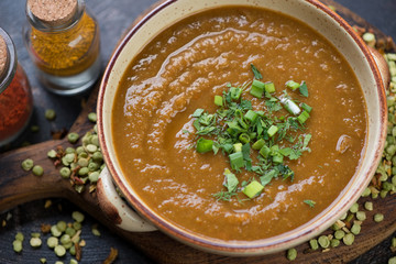 Close-up of pea soup with curry cooked in south asian style, selective focus