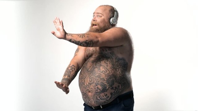 Man listening to music and dancing