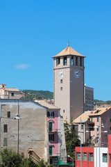 Fototapeta na wymiar Medieval tower with hours. Savona, Italy