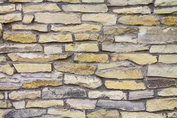 Decorative handmade stone wall for the background.