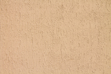 Wall of brown plaster for the background.
