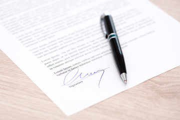 Man signing a contract