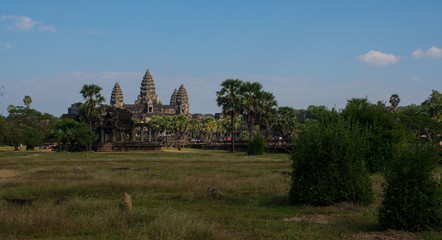 Fototapeta na wymiar The wonder of the world, the far view of antique city named Angor Wat, it is also the world heritage nowadays. This ancient remains has its long history of Siem Reab city in Cambodia country