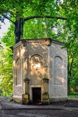 Old antique ice house in the castle park in Pszczyna. Eiskeller Tower in neo roman style in the park in Pszczyna, Poland.