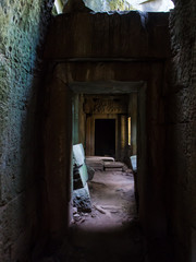 The dark scary shadow door, no one knows where this route lead us to but it looks so horror. Especially, it is in the antique location such a Angor Thom, the ancient collapsed castle inside Angor Wat