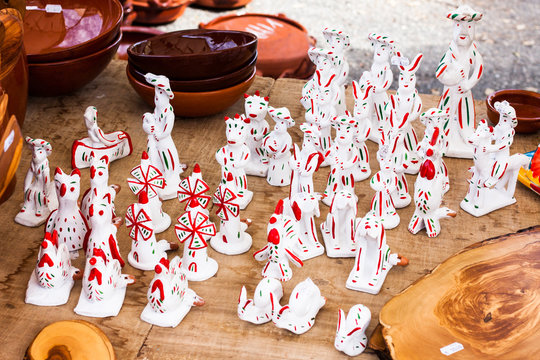 Siurells, typical Majorcan hand painted clay figures with a whistle at Sineu market, Mallorca, Spain