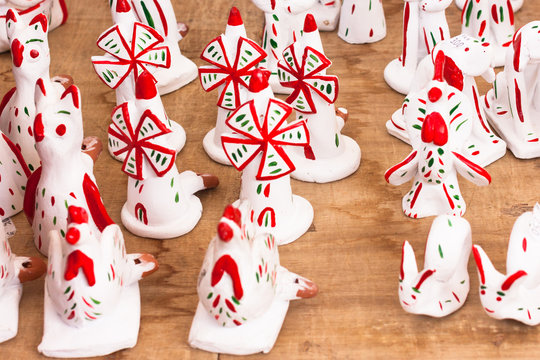Siurells, typical Majorcan hand painted clay figures with a whistle at Sineu market, Mallorca, Spain
