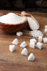 Fototapeta na wymiar Various types of sugar, white sugar on wooden table.