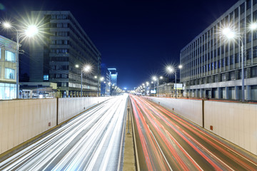 Fototapeta na wymiar View of transport metropolis, traffic and blurry lights