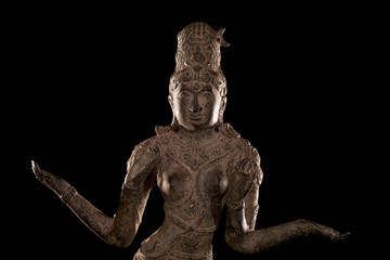 Close up of traditional antique bronze statue of Lakshmi Hindu Goddess of wealth prosperity and fortune.